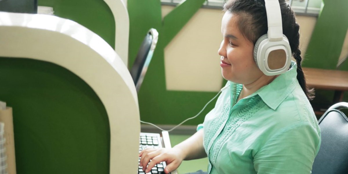 Blind Woman Sitting at a Computer Using Morphic