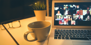 Zoom call on a Mac Book with tea
