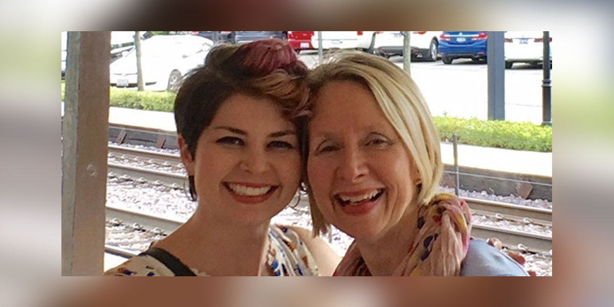 mother and daughter smiling